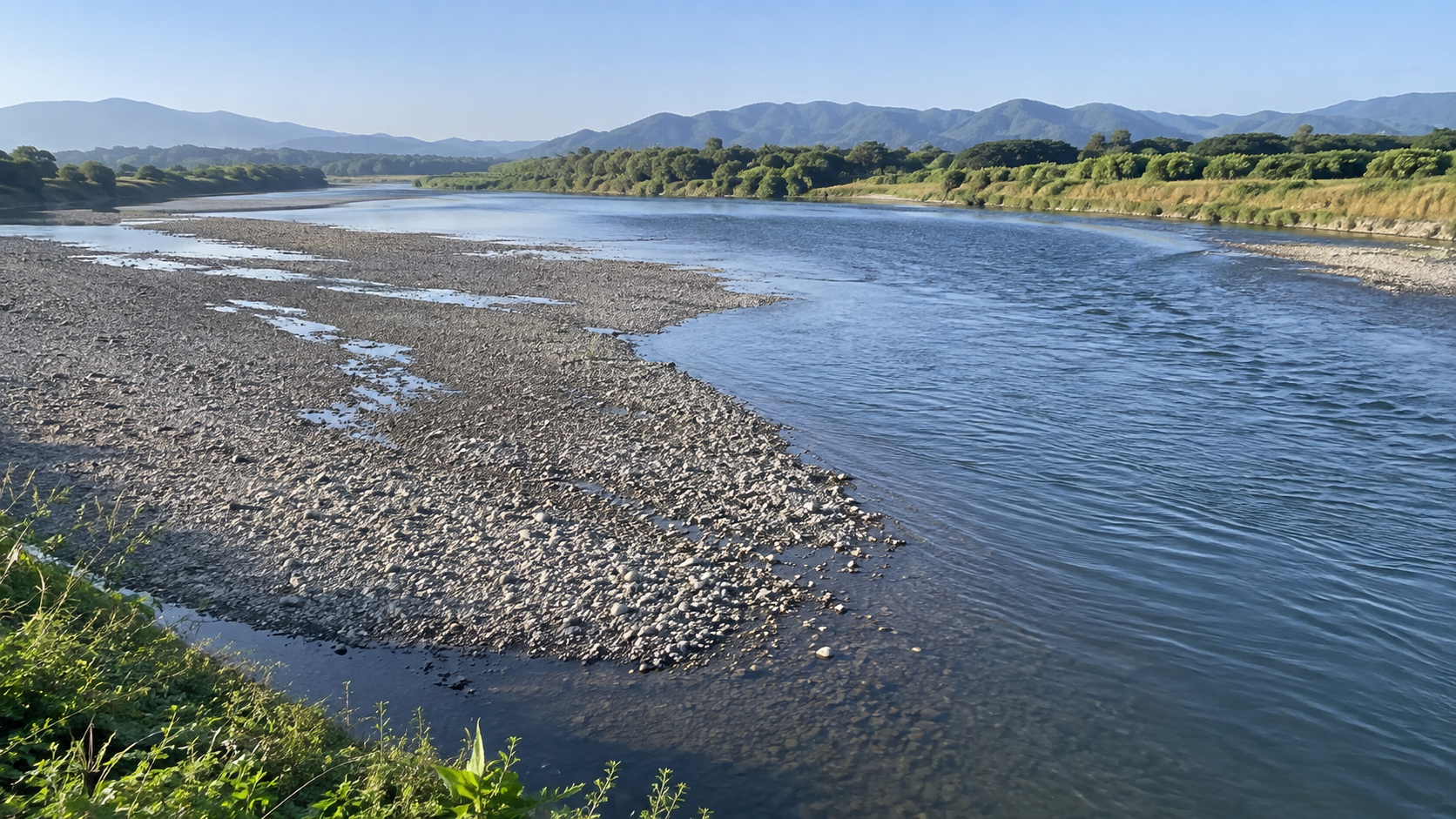 干潮時に浅い砂州と深い流路が見える河川の生成イメージ